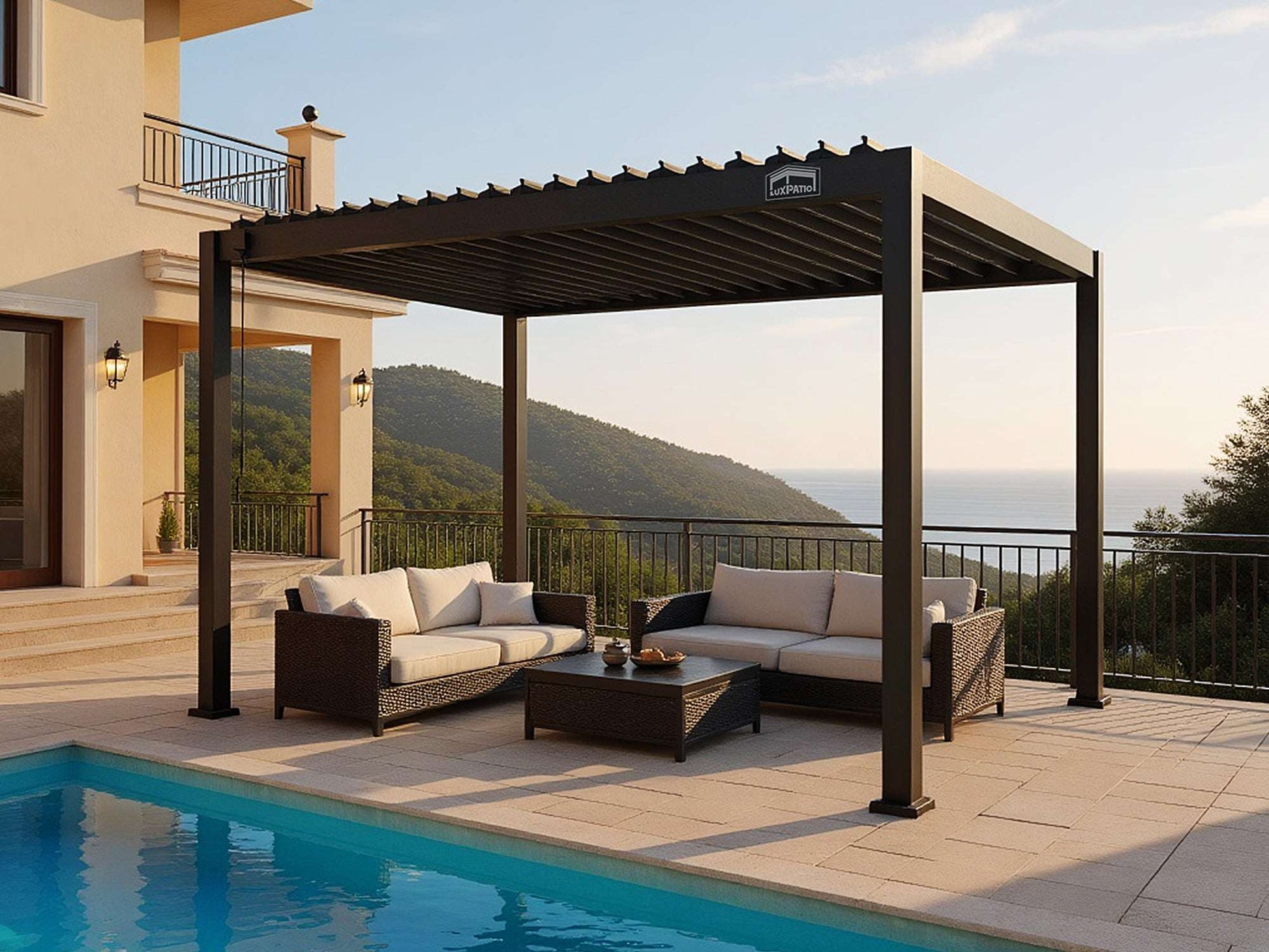 LuxPatio black aluminum louvered pergola with patio furniture and pool, creating an elegant outdoor living space.