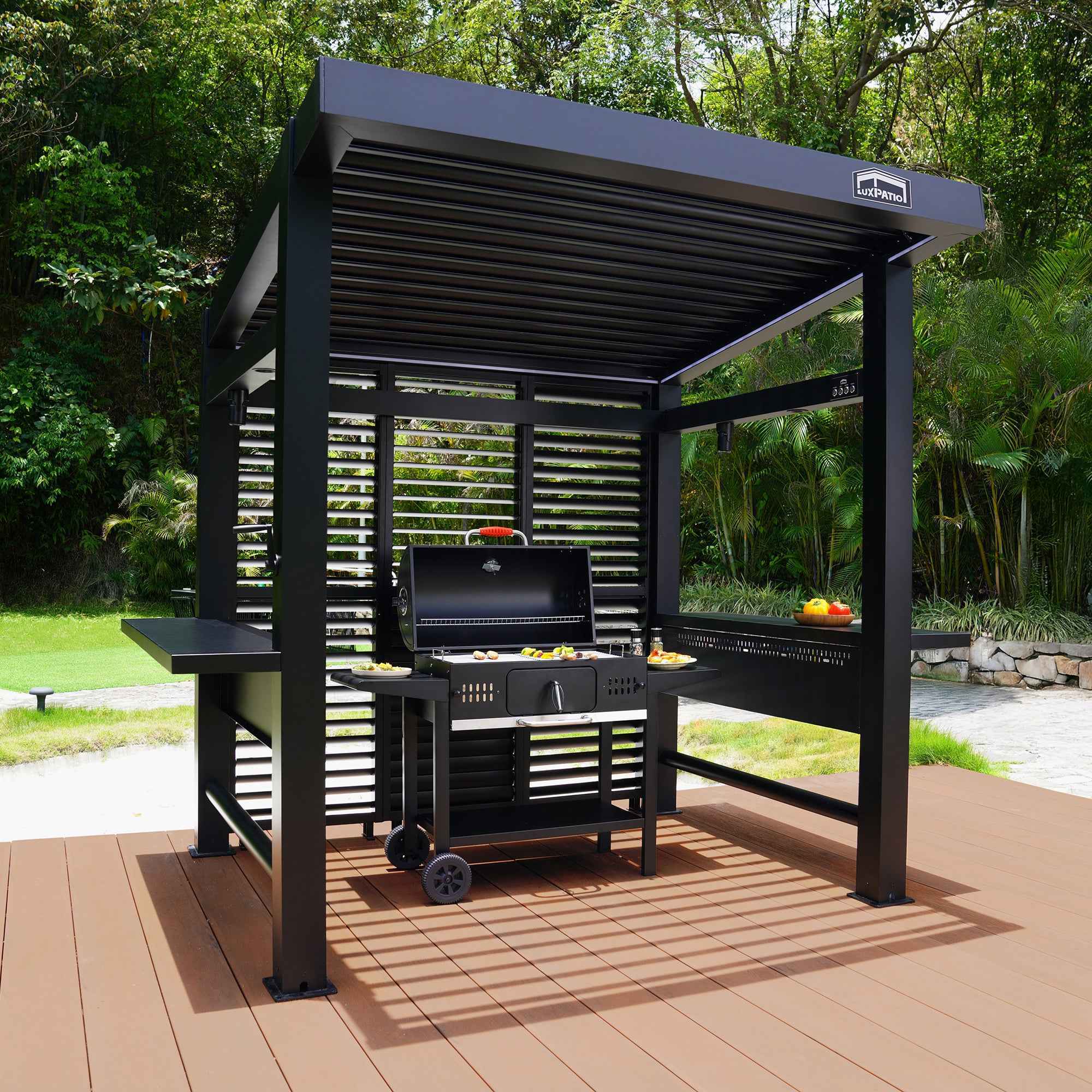 Black LuxPatio Grill Louvered Pergola Lite with grill and side tables, perfect for outdoor entertaining.