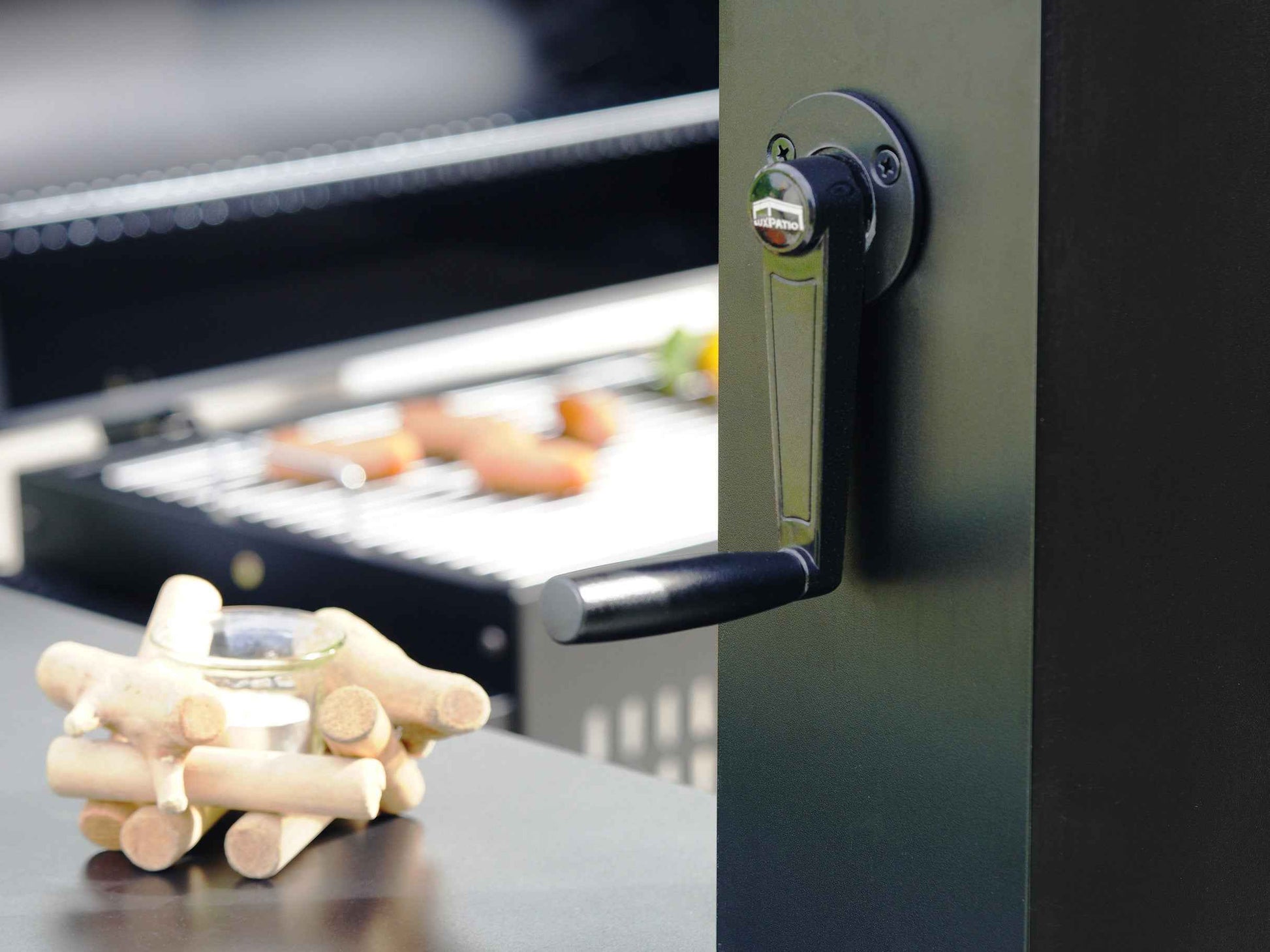 Grill Louvered Pergola Pro adjustment handle with LuxPatio logo, black aluminum, outdoor grilling setup